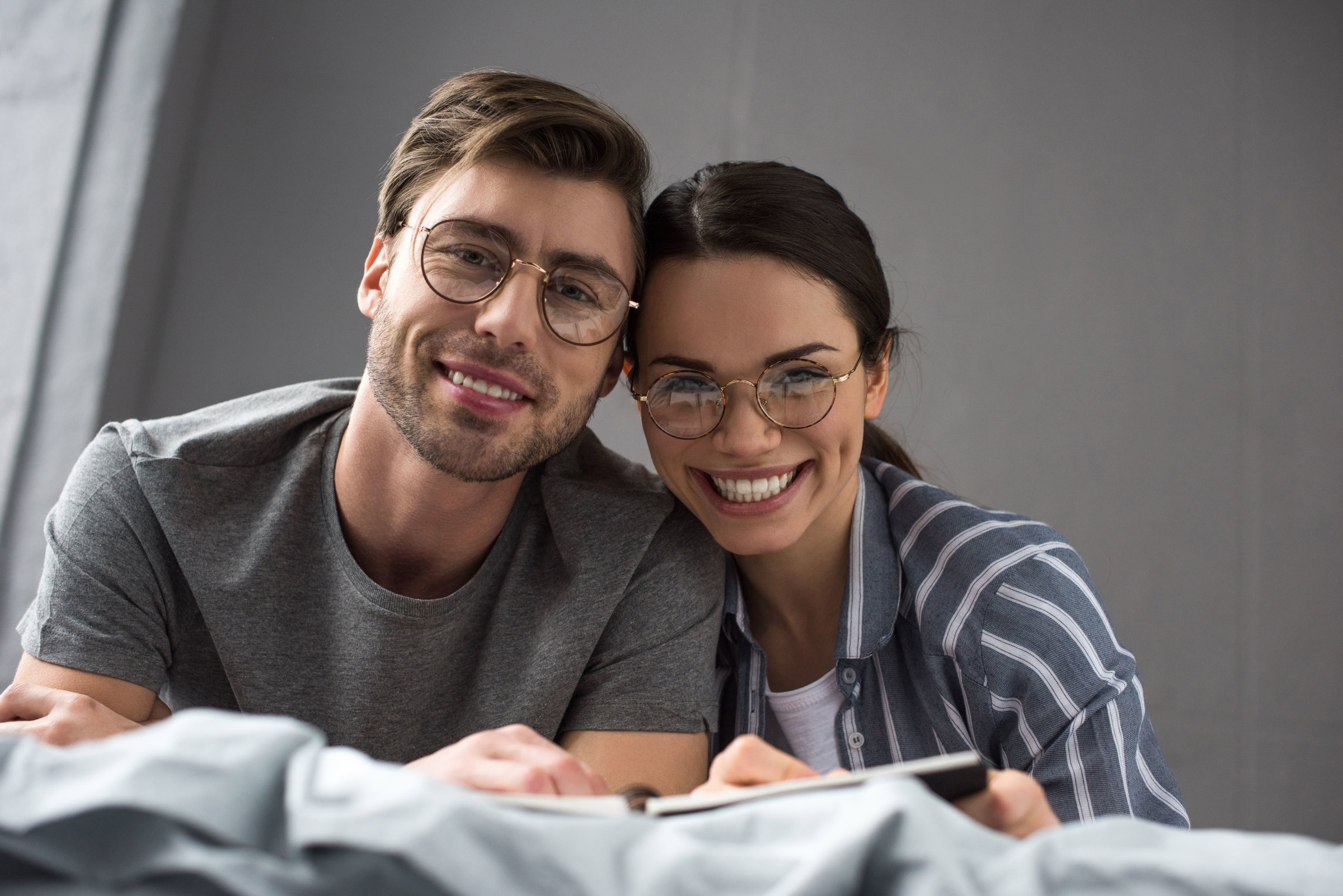 People wearing glasses featured by Jewel City Optometry